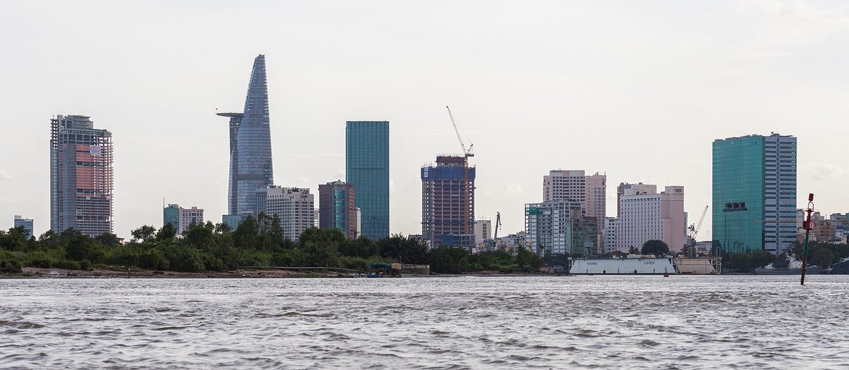 Ho Chi Minh City's skyline, including the Bitexco Financial Tower, seen across the Saigon River